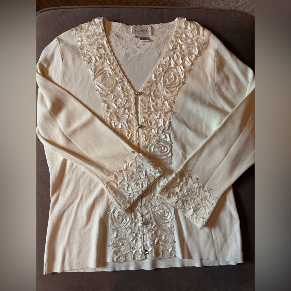 Elegant Cream Sweater with Floral Detailing